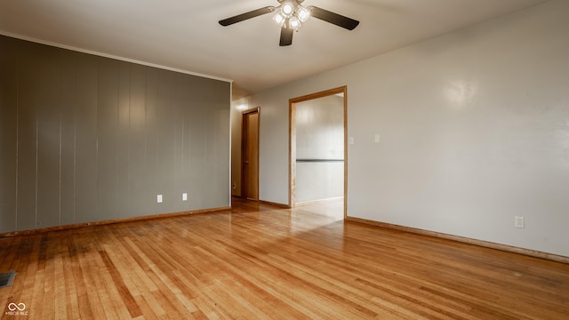 5861 S 100 W, Fountaintown, IN 46130 - spare room featuring light wood finished floors, baseboards, and a ceiling fan