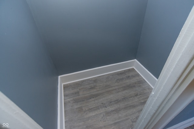 details with wood-type flooring