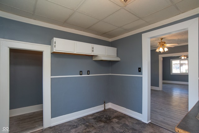 laundry area with ornamental molding, ceiling fan, and dark hardwood / wood-style flooring