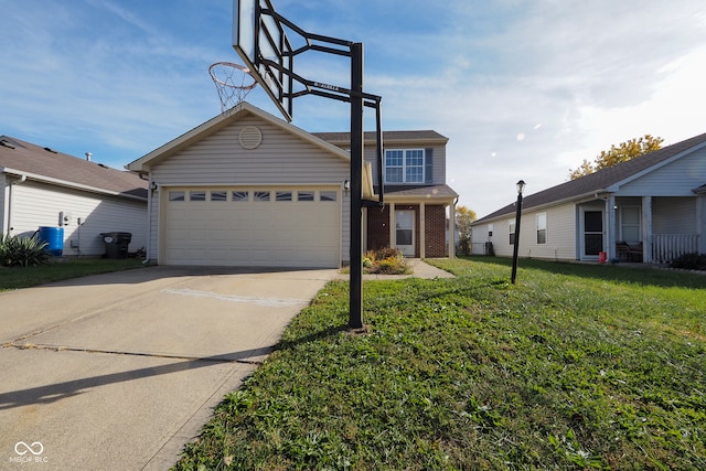 view of front of home featuring a front lawn and a garage