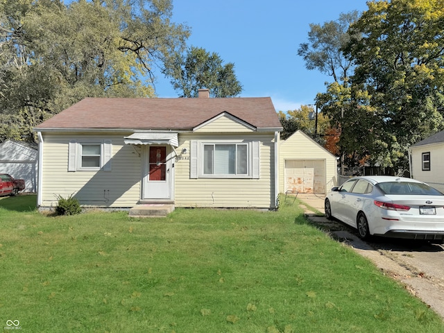 bungalow-style house featuring a front lawn