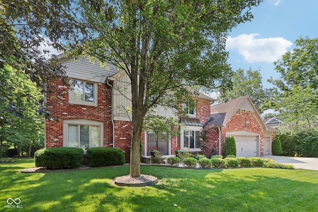 view of front facade featuring a front lawn and a garage