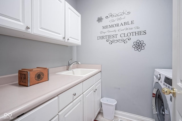 laundry room featuring washer / clothes dryer, sink, light tile patterned floors, and cabinets