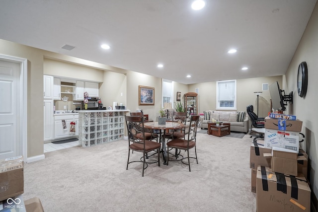 view of carpeted dining space