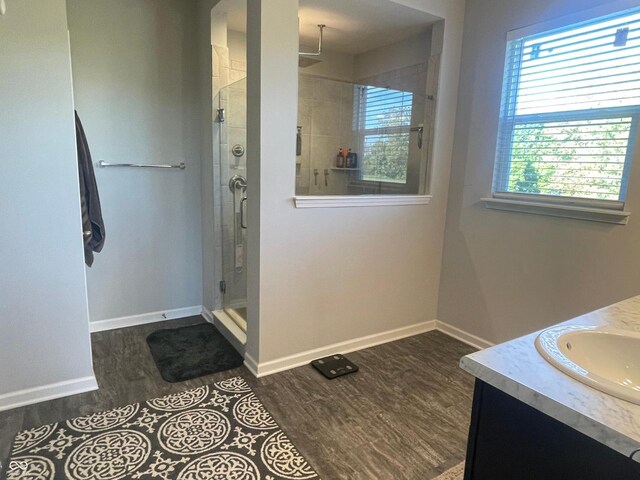 3503 W 100 N, Bargersville, IN 46106 - full bathroom featuring a shower stall, wood finished floors, vanity, and baseboards