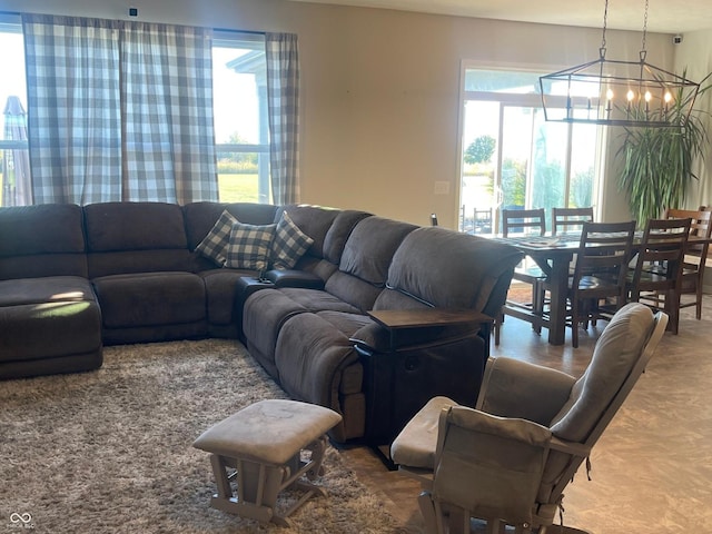 living room featuring an inviting chandelier