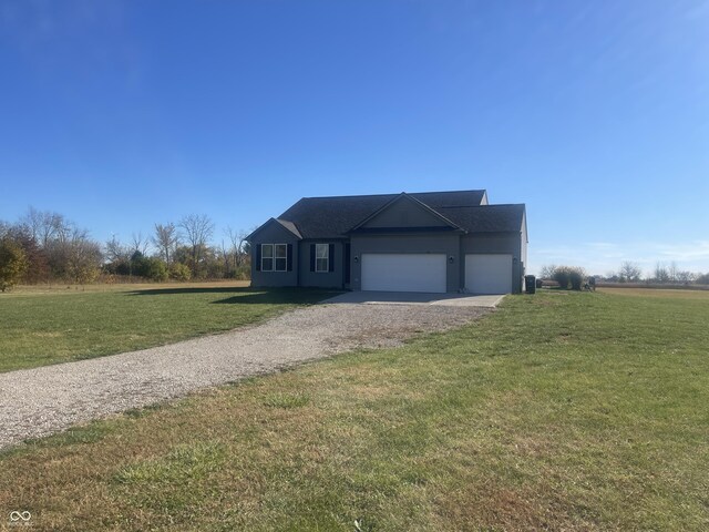3503 W 100 N, Bargersville, IN 46106 - ranch-style house with driveway, a front yard, and an attached garage