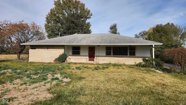 ranch-style house with a front yard