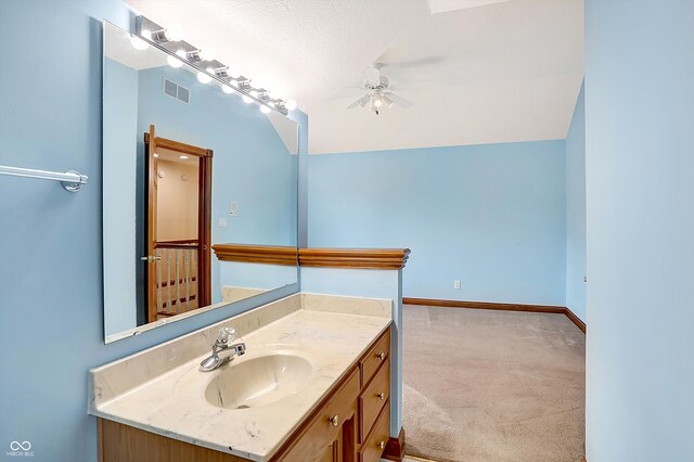 bathroom with vanity and ceiling fan