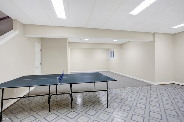 playroom with carpet and baseboards