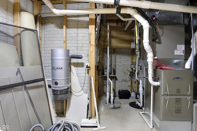 utility room with heating unit