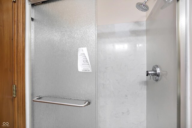 bathroom featuring a stall shower