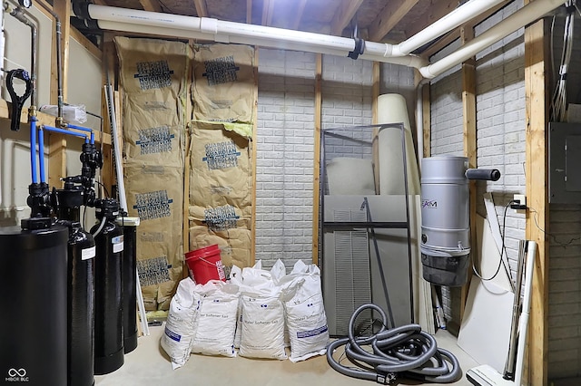 storage area with water heater and electric panel