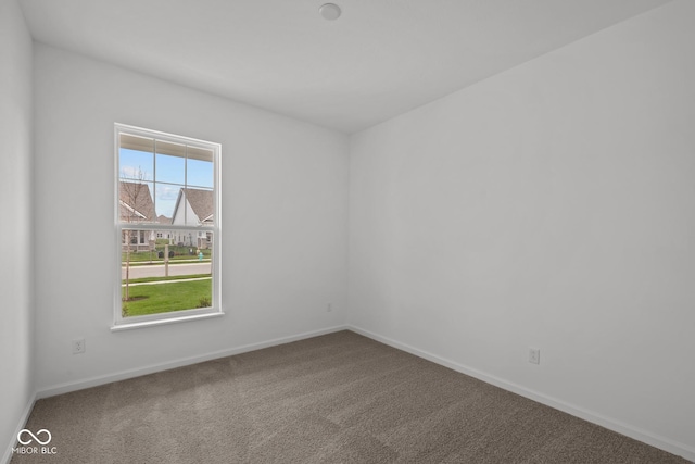 view of carpeted spare room