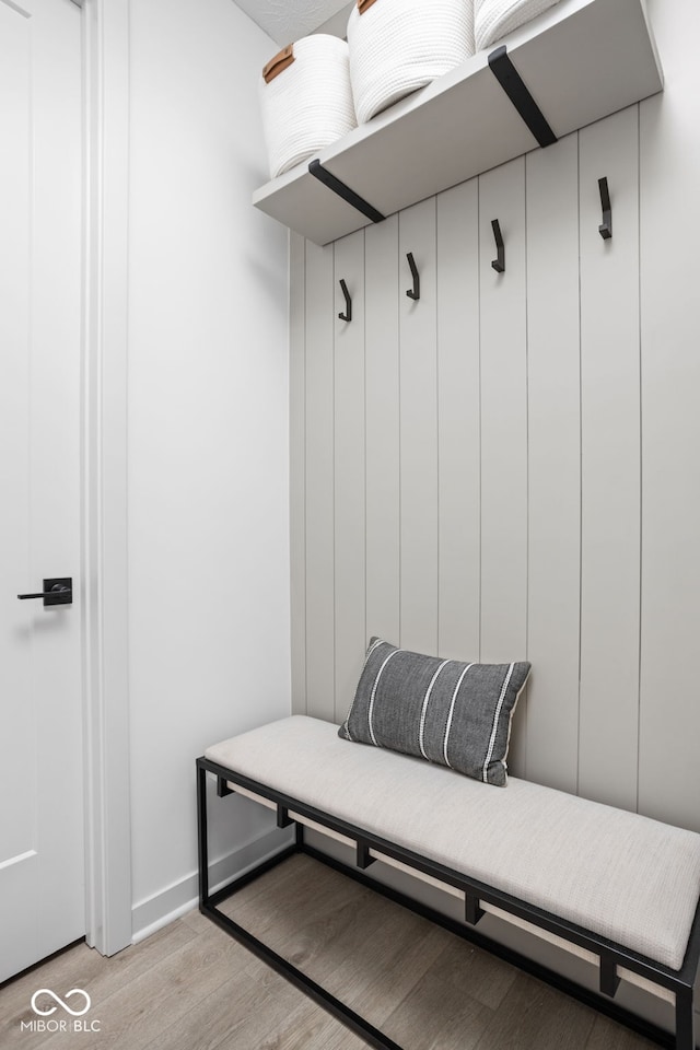 mudroom with light hardwood / wood-style floors