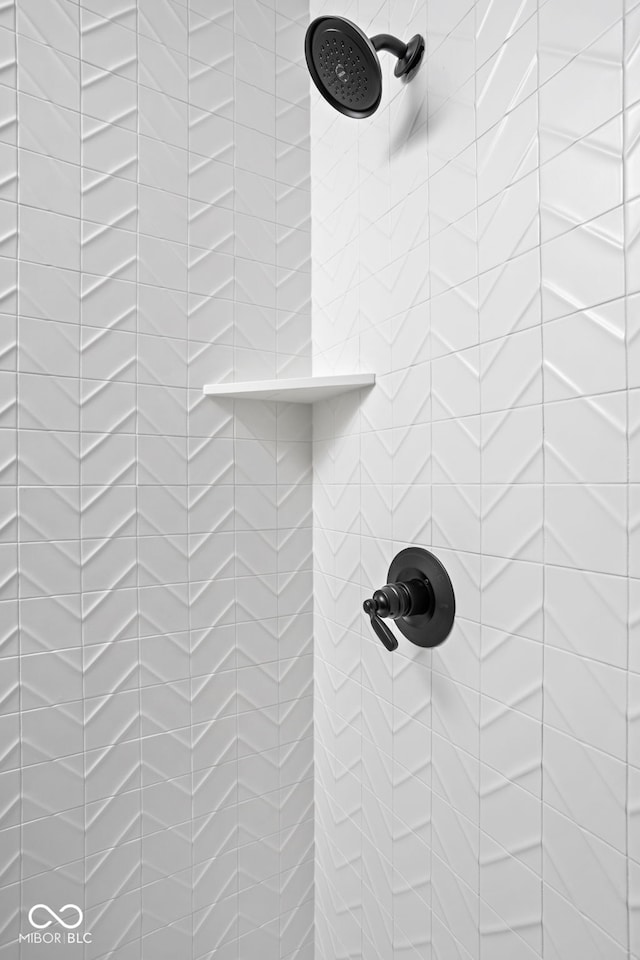 room details with a tile shower