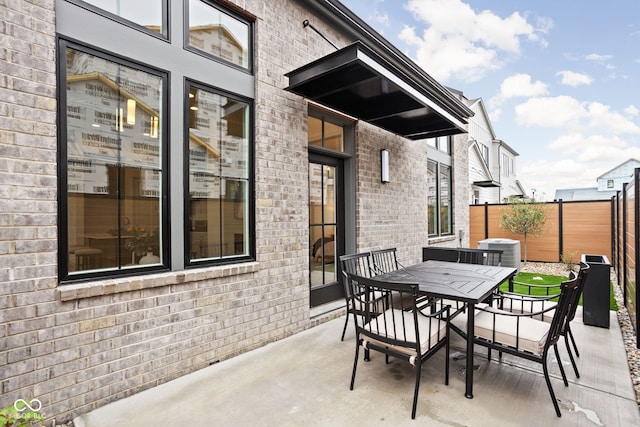 view of patio featuring cooling unit