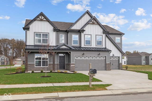 view of front facade with a garage and a front lawn