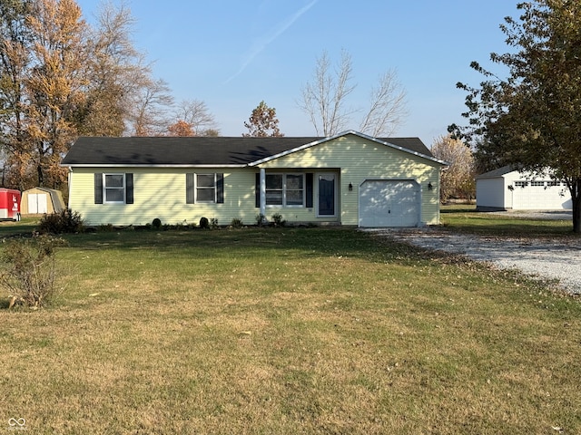 single story home featuring a front yard and a garage