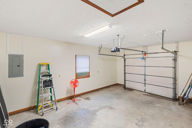 garage with electric panel and a garage door opener