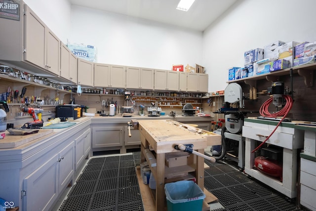 kitchen featuring dark tile patterned floors