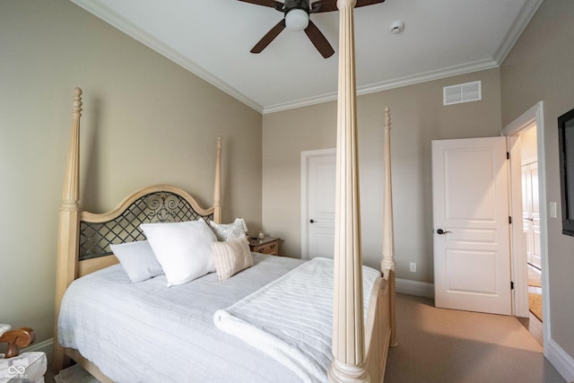 bedroom with crown molding, light colored carpet, and ceiling fan