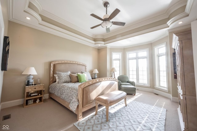 bedroom featuring ceiling fan, ornamental molding, and light carpet