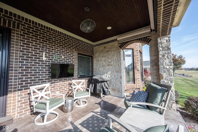 view of patio / terrace with a grill