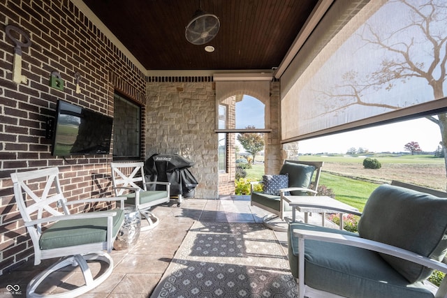 view of patio featuring a rural view and grilling area