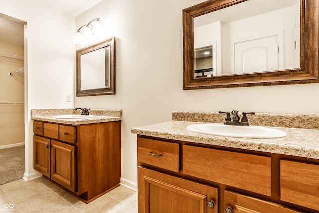 bathroom featuring tile patterned floors and vanity