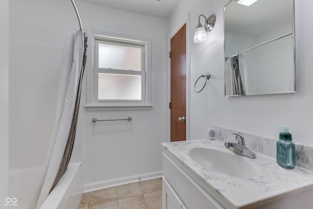 bathroom with vanity, shower / bath combo, and tile patterned flooring