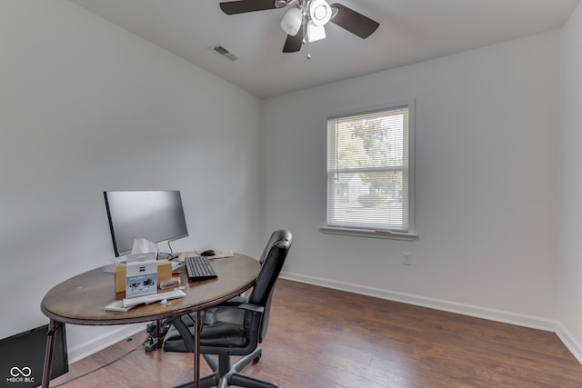 office with ceiling fan and dark hardwood / wood-style flooring