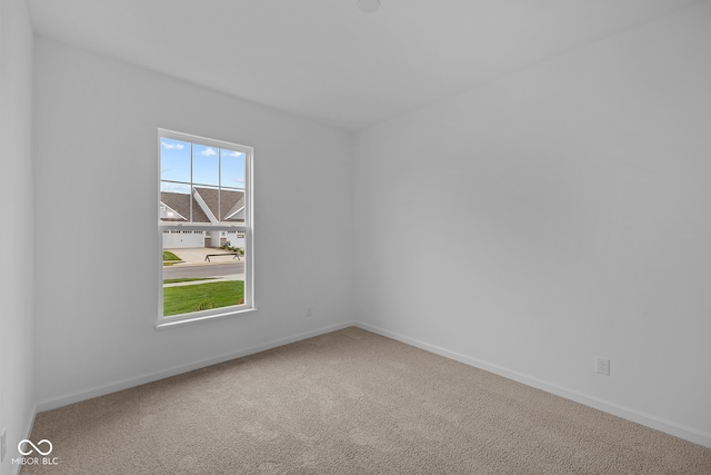 unfurnished room featuring carpet floors