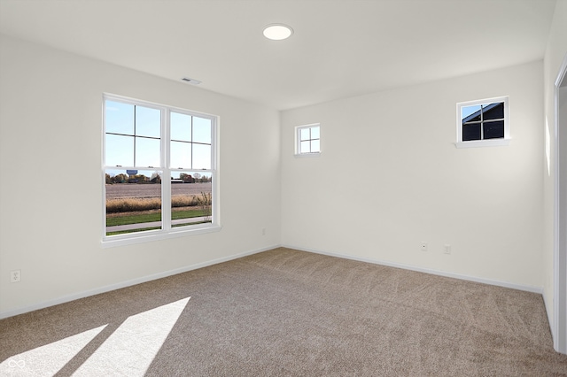 view of carpeted spare room