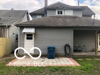 rear view of house featuring a patio