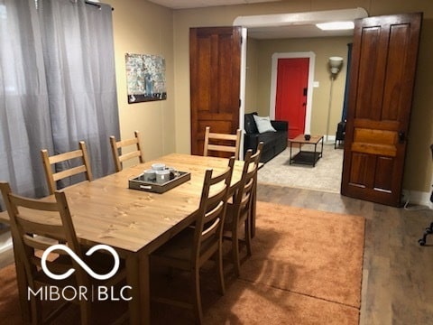 view of carpeted dining area