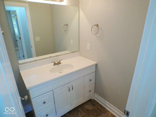 bathroom with vanity and tile patterned floors