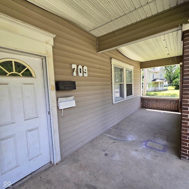 709 W Riverside Ave, Muncie, IN 47303 - property entrance with covered porch