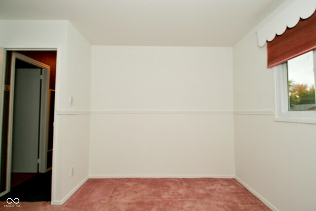 empty room with carpet floors