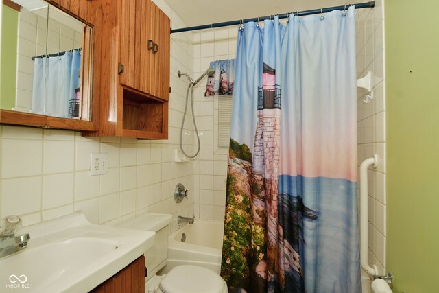 full bathroom featuring decorative backsplash, toilet, shower / bath combination with curtain, tile walls, and vanity