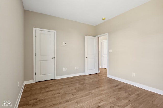 unfurnished bedroom with light hardwood / wood-style flooring