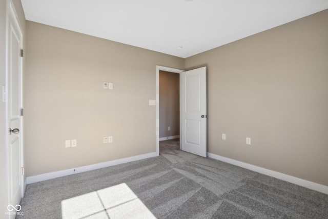 unfurnished bedroom featuring carpet flooring