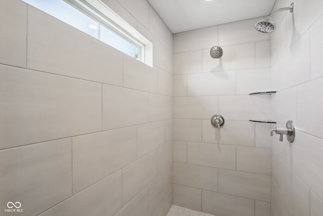 bathroom featuring tiled shower