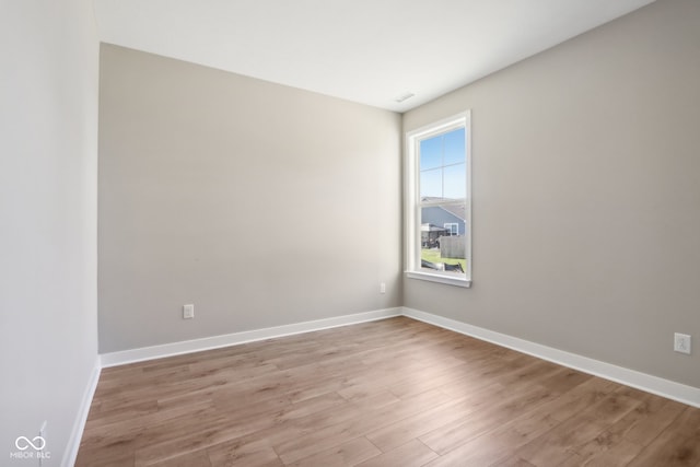 empty room featuring light hardwood / wood-style floors