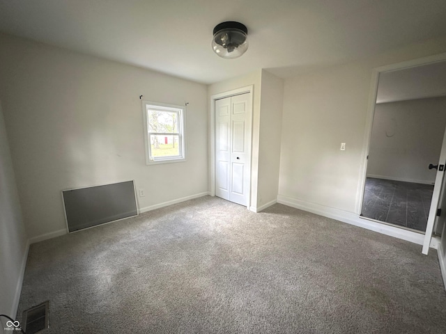 unfurnished bedroom featuring carpet flooring