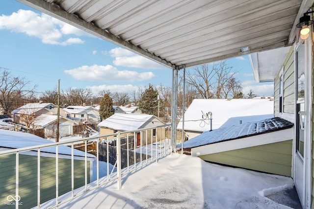 view of snow covered deck