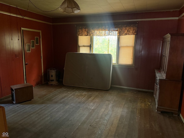 interior space featuring hardwood / wood-style flooring and wood walls