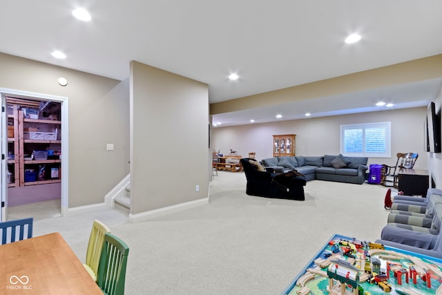 playroom featuring light colored carpet