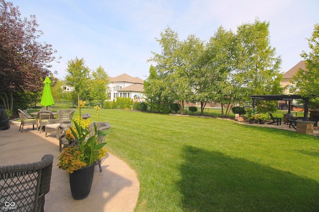 view of yard featuring a pergola and a patio