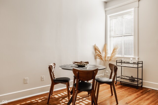 dining room featuring hardwood / wood-style flooring